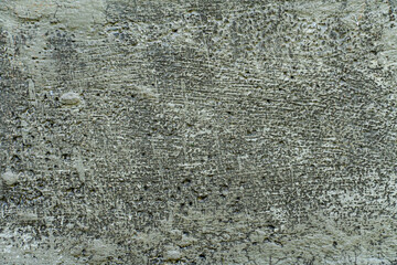 The texture of a stone wall, flooring, concrete destruction, metal corrosion and rusty antiquity, the basis of construction reinforcement and ceilings, paint chips