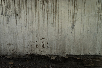 Obraz premium The texture of a stone wall, flooring, concrete destruction, metal corrosion and rusty antiquity, the basis of construction reinforcement and ceilings, paint chips