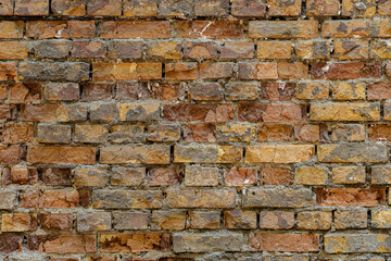 Brick wall texture, loft style, destruction of concrete and stone, antiquity corrosion, foundations of building floors, chips, cracks