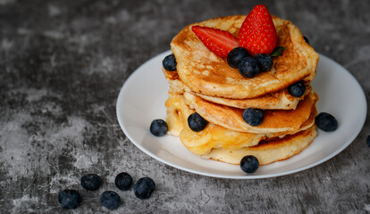Pancakes on white plate