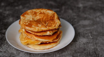 Pancakes on white plate