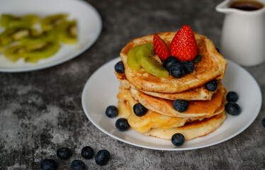 Pancakes on white plate