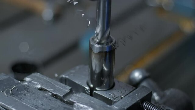 Drilling machine with drill bit for tapping