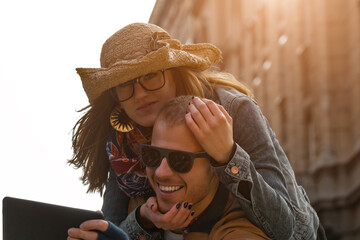 Young couple making selfie on the street in urban area.