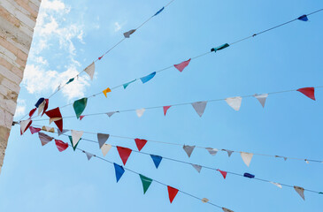 Strings of colored bunting flags