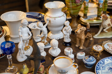 Assorted ceramic souvenirs on counter at market