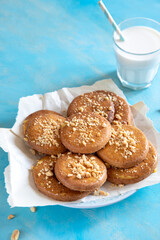 homemade shortbread cookies with peanuts on a trendy blue background. peanut cookie. flat lay, place for text, food background