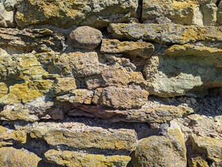 texture of the facade of a building made of old stones