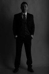 Fototapeta premium Black and white portrait of a man in jacket