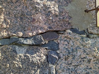 texture of the facade of a building made of old stones