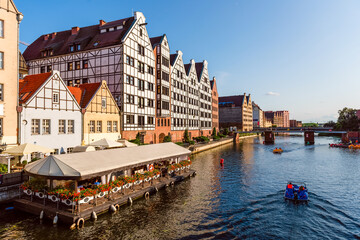 Naklejka premium Gdansk beautiful old town and view on floating cafe on a motlawa river