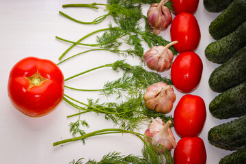 Good organic cucumbers and red tomatoes and garlic