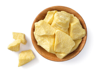 cocoa butters in the wooden bowl, isolated on white background, top view