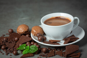 Chocolate on the dark background. World Chocolate Day concept