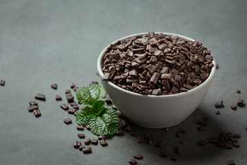 Chocolate on the dark background. World Chocolate Day concept