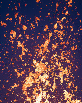 Close-up explosion of fresh lava flowing from volcano eruption in Geldingadalur, Iceland.