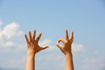 Deaf asia woman using sign language.