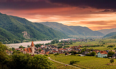 Fototapeta premium View of small austrian village Weissenkirchen in der Wachau on a Danube river bank, Wachau valley, Austria.