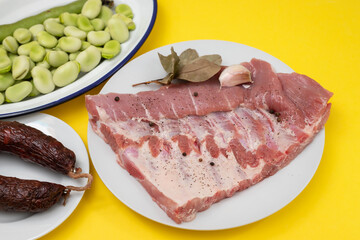 ingredients for portuguese dish green beans, smoked sausage and meat