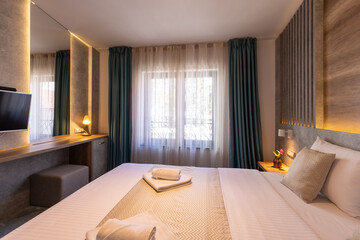 Fototapeta premium Interior of a hotel bedroom in luxury hotel