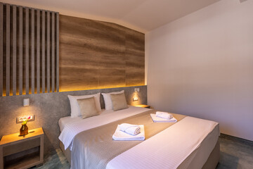 Fototapeta na wymiar Interior of a hotel bedroom in luxury hotel