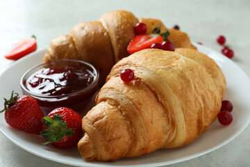 Concept of tasty breakfast with croissants, close up