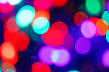 Multicolor Bokeh in a blue natural background, defocused