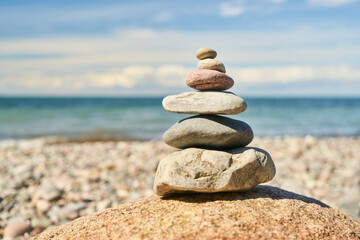Stacked stones as a zen meditation concept on the beach