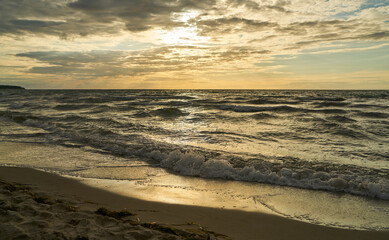 Sunset on the beach by the Baltic sea