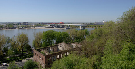 Fototapeta na wymiar View on Voroshilovsky Bridge, built for the World Cup 2018. In the foreground Paramonovsky warehouses