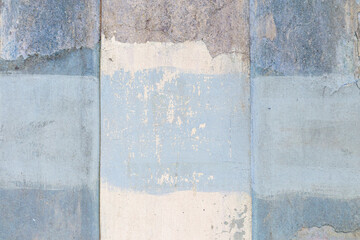 Wall with blue weathered paint