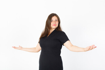 young not thin girl in a black dress. Chubby young woman. White background. Red lips. Studio photo. Happy elegant lady. Love of herself. Love yourself. Diet, weight loss