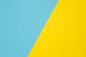 Two-color background made with diagonal line. Yellow and light blue colorway.
