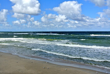 Empty beach, waves and dramatic sky at the Baltic sea shore line, Zelenogradsk, Kaliningrad region, Russia