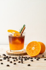 Fototapeta premium black coffee with orange and lemon juice