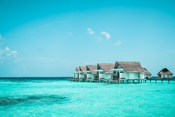 Beautiful tropical Maldives resort hotel and island with beach and sea - obrazy, fototapety, plakaty
