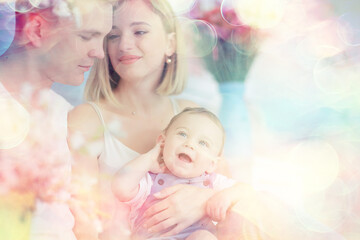 baby with parents in a cozy house / healthy young family mom dad and baby, happiness smile