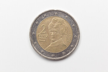 Official coin of two euros of the European Economic Community. Legal tender metal coin with different images depending on the country that issues the coin.