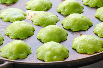 Siam Pandan Thai dessert or Kanom Krok Singapore or Kanom Krok Bai Toey - obrazy, fototapety, plakaty