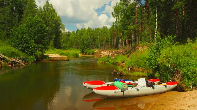 Rafting on the forest river on beautiful sunny summer days. Unique natural locations far from civilization.
Vacation on the forest river. 