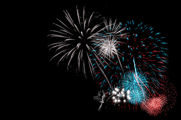 Red and Blue Fireworks on Black background