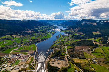 view of the river and mountains, sunny day, sheep clouds, green fields, blue water in norway, dji air2s Gudbrandsdal norway Faavang Fåvang © Sebastian