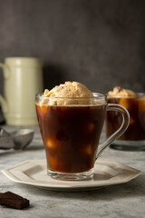 Ice cream with coffee in glass cup. Coffee affogato drink.