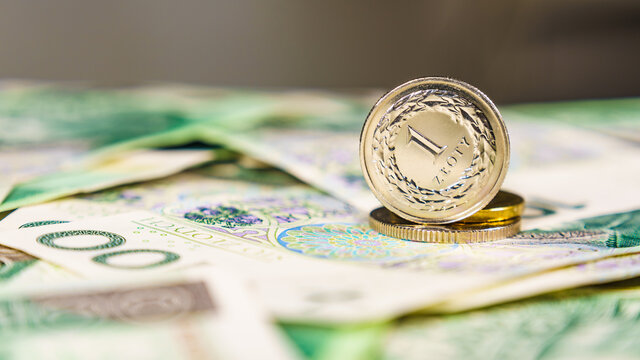 Close up polish zloty banknotes and coins