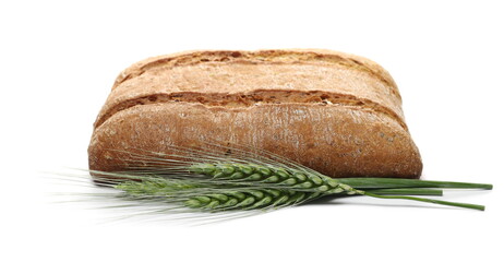 Rectangular wheat bread loaf with young green ears of wheat isolated on white background