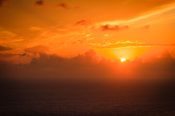 Sunset or sunrise over sea surface