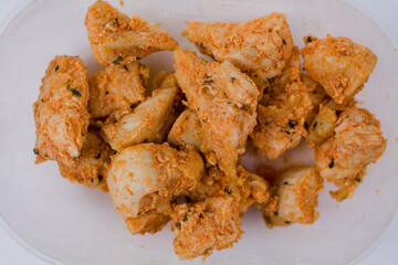 fried chicken curry in paprika close-up nuggets