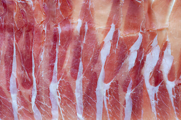 Prosciutto dry cured ham texture close up