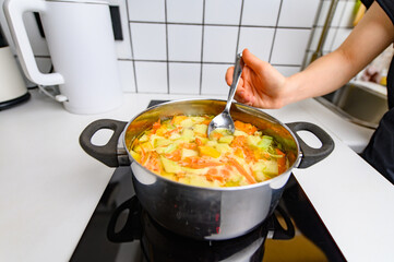 Cooking Bright Vegetable Soup on the Stove