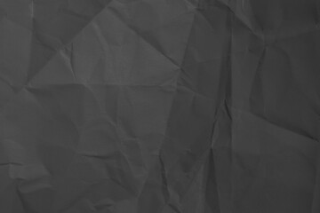 Dark gray background from crumpled paper